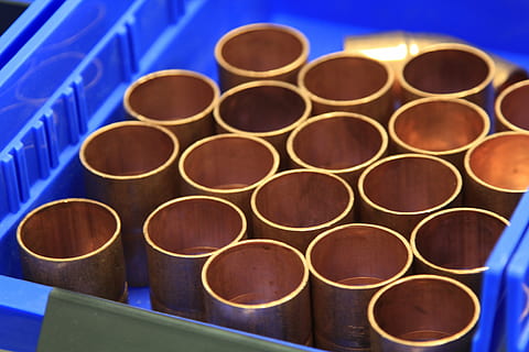 brown, cups, blue, tray, copper coupler, copper pipe, coupler, plumber, copper, connector, pipeline, in a row, large group of objects, indoors, food and drink, no people, order, abundance, circle, shape, industry, warehouse, close-up, geometric shape, factory, food, group, architecture, group of objects, container, 2K, CC0, public domain, royalty free