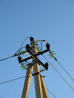 electricity, wire, post, engineering, insulators, current, sky, low angle view, clear sky, blue, nature, cable, technology, day, copy space, fuel and power generation, power line, outdoors, connection, no people, power supply, metal, working, electricity pylon, 4K, CC0, public domain, royalty free