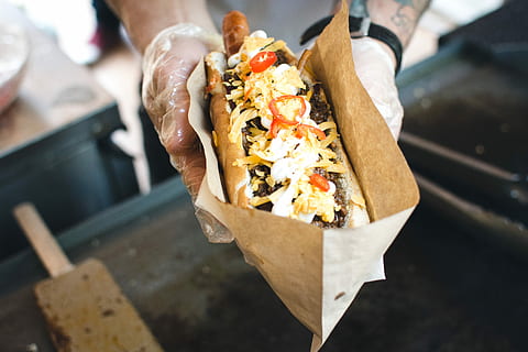 hot, dog, hands, Hot dog, meat, food, cooking, gourmet, human Hand, meal, people, fast Food, take Out Food, freshness, indoors, food And Drink, one person, close-up, human body part, hand, holding, focus on foreground, ready-to-eat, vegetable, real people, high angle view, healthy eating, unrecognizable person, wellbeing, lifestyles, paper, snack, human limb, japanese food, 5K