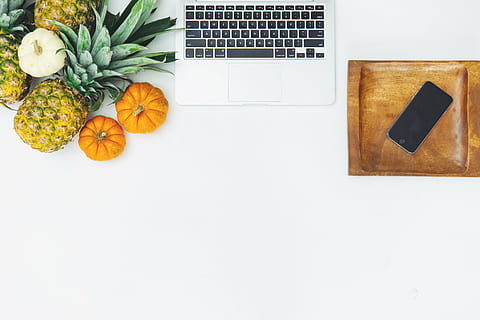 pineapple, squash, beside, white, laptop keyboard, dessert, appetizer, fruit, juice, crop, pumpkin, garlic, laptop, macbook, apple, business, computer, table, food, desk, technology, wood - Material, food and drink, communication, healthy eating, indoors, wireless technology, copy space, freshness, connection, no people, high angle view, vegetable, directly above, orange color, keyboard, 5K, CC0, public domain, royalty free