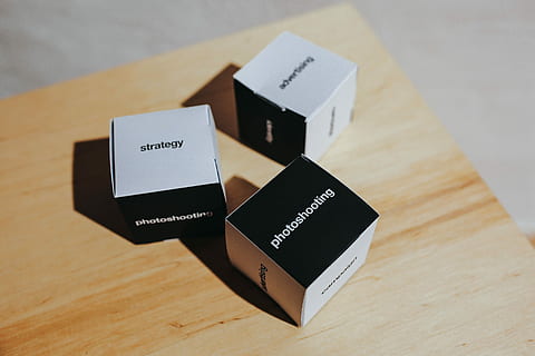 little, paper boxes, words, paper, boxes, table, box, strategy, cardboard, photoshooting, advertising, wood - Material, business, no people, indoors, close-up, neat, day, text, still life, western script, communication, high angle view, focus on foreground, group of objects, selective focus, large group of objects, container, brown, group, capital letter, 5K, CC0, public domain, royalty free