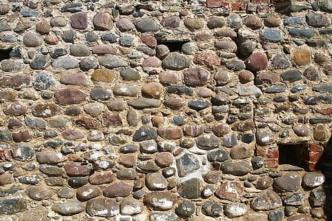 wall, cobbles, ancient, backgrounds, full frame, pattern, no people, day, solid, textured, architecture, outdoors, close-up, built structure, stone, wall - building feature, high angle view, stone - object, large group of objects, nature, brown, design, in a row, pebble, textured effect, 2K, CC0, public domain, royalty free