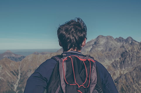 guy, man, backpack, knapsack, hiking, trekking, adventure, mountains, peaks, outdoors, nature, landscape, rear view, mountain, sky, one person, lifestyles, headshot, real people, leisure activity, portrait, environment, adult, scenics - nature, beauty in nature, standing, clear sky, mountain range, looking at view, hairstyle, 4K, CC0, public domain, royalty free