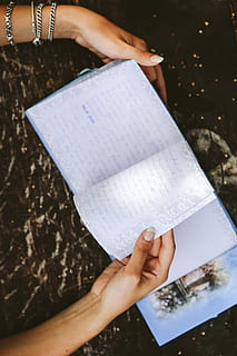 diary, table, Woman reading, woman, book, notebook, hands, reading, memories, journal, memoirs, human Hand, holding, people, paper, one Person, document, human body part, adult, adults only, hand, real people, women, lifestyles, finger, publication, human finger, leisure activity, indoors, education, focus on foreground, high angle view, nail, 5K