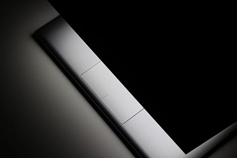 laptop, apple, macbook, computer, browser, research, study, school, business, work, desk, no people, indoors, copy space, close-up, dark, backgrounds, paper, full frame, pattern, fluorescent light, built structure, black color, architecture, black background, darkroom, white color, high angle view, ceiling, illuminated, 5K, CC0, public domain, royalty free