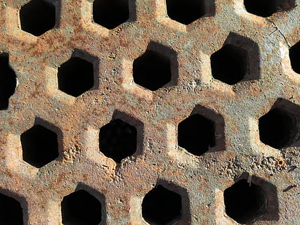 pattern, metal, stainless, form, rusted, brown, hexagon, hexagons, irregular, misshapen, full frame, backgrounds, hole, close-up, no people, day, old, built structure, outdoors, architecture, geometric shape, nature, focus on foreground, obsolete, detail, textured, side by side, shape, deterioration, iron, wheel, 4K, CC0, public domain, royalty free
