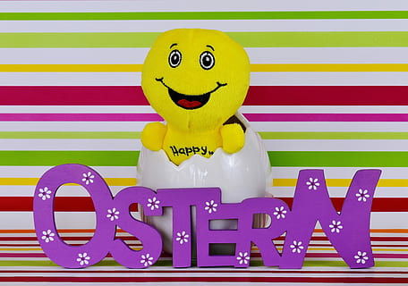 Happy Easter, Smiley, easter, cheerful, funny, eggshell, laugh, cute, toy, happiness, smiling, fun, multi colored, representation, no people, table, yellow, anthropomorphic smiley face, text, indoors, animal representation, still life, close-up, communication, striped, anthropomorphic, purple, 4K, CC0, public domain, royalty free