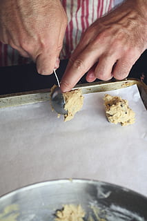 Cookie Dough, Raw, Cookie, Dough, Baking, cookie, dough, kitchen, treat, cooking, dessert, sweet, chocolate chip, home, preparing, homemade, bake, cookie sheet, parchment paper, hands, chef, cook, man, apron, measuring spoon, measuring, human hand, human body part, preparation, indoors, making, one person, hand, real people, food, food and drink, holding, preparing food, freshness, unrecognizable person, kitchen utensil, table, human finger, finger, lifestyles, close-up, 4K, CC0, public domain, royalty free