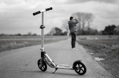 child, boy, landscape, roller, road, play, black and white, curious, distant, away, transportation, one person, full length, mode of transportation, focus on foreground, sport, nature, day, adult, sky, leisure activity, outdoors, cloud - sky, men, grass, motorcycle, real people, sports equipment, riding, 4K, CC0, public domain, royalty free