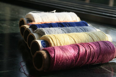 reels, thread, sewing, sew, craft, textile, tailor, needlework, bobbin, fibers, spool, wool, indoors, industry, textile industry, art and craft, multi colored, sewing item, material, cotton, close-up, still life, variation, selective focus, ball of wool, sewing needle, 4K, CC0, public domain, royalty free
