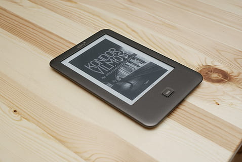 E-Book, E-Reader, Shine, E-Paper, tolinos shine, ebook, e-ink, book, technology, no people, indoors, communication, close-up, price tag, wood - material, high angle view, still life, table, wireless technology, text, connection, western script, wood, portable information device, screen, brown, day, device screen, pattern, wood grain, electrical equipment, 4K, CC0, public domain, royalty free