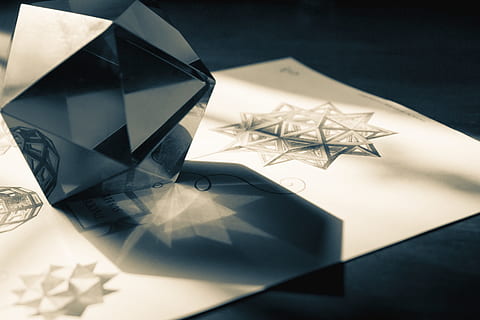 grey, 3d, glass paperweight, white, printer paper, black, gemstone, symbol, light, shadow, polygon, glass, daylight, creative thinking, energy, creative, idea, power, design, conceptual, illumination, think, inspiration, solution, luxury, no people, close-up, studio shot, indoors, gift, high angle view, paper, pattern, still life, shape, transparent, reflection, art and craft, jewelry, glass - material, creativity, crystal, 4K