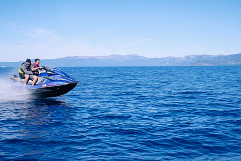 two, men, riding, personal, watercraft, blue, calm, sea, daytime, person, ocean, water, waves, nature, horizon, mountain, sky, clouds, jet ski, ride, sport, adventure, people, drive, nautical vessel, transportation, one person, adult, outdoors, day, mode of transportation, waterfront, real people, leisure activity, lifestyles, travel, beauty in nature, 4K