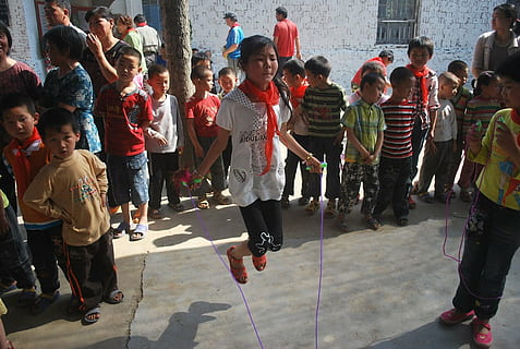 jump, rope, jumping, play, exercise, girl, people, street, cultures, group of people, crowd, large group of people, real people, men, lifestyles, city, women, leisure activity, standing, arts culture and entertainment, day, dancing, casual clothing, architecture, enjoyment, celebration, 720P, CC0, public domain, royalty free