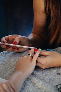 woman, holding, white, stick, filing, hands, manicure, nail technician, nails, ring, human hand, human body part, hand, adult, women, indoors, skill, two people, real people, body part, nail polish, people, nail, occupation, lifestyles, close-up, leisure activity, finger, 5K