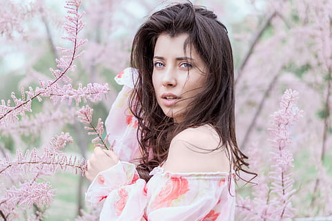 woman, pink, floral, off-shoulder, flowers, shoulder, women, outdoors, caucasian Ethnicity, adult, one Person, nature, pink Color, color Image, flower, people, time Of Day, day, females, tree, springtime, young Women, image Technique, brown Hair, beauty, only women, one woman only, adults only, plant, flowering plant, hairstyle, long hair, young adult, hair, beauty in nature, portrait, looking at camera, standing, beautiful woman, contemplation, cherry blossom, innocence, 5K, CC0, public domain, royalty free