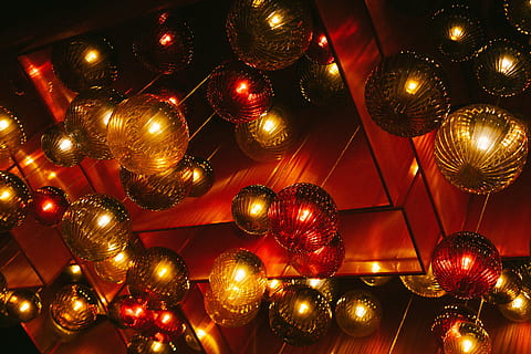 photo, assorted-color bauble, hanging, ceiling, red, gold, pendant, lamps, christmas, lighting, ball, lamp, bulb, design, hang, celebration, lighting equipment, christmas decoration, backgrounds, full frame, illuminated, christmas ornament, nightclub, decoration, holiday, no people, large group of objects, low angle view, night, event, in a row, indoors, nightlife, 5K