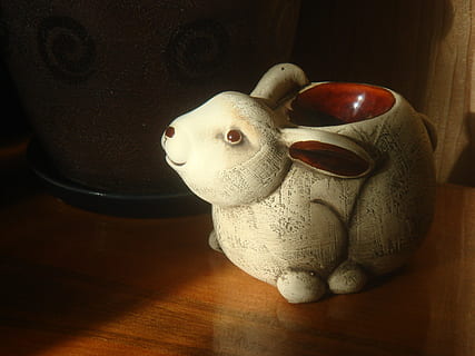 hare, rabbit, candlestick, ceramic rabbit, fragrance, shadow, light, representation, indoors, toy, no people, table, still life, stuffed toy, high angle view, wood - material, art and craft, close-up, figurine, human representation, craft, mammal, creativity, sculpture, 2K, CC0, public domain, royalty free