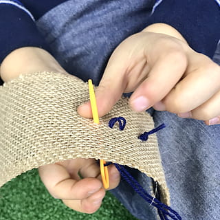sewing, threading, toddler, thread, sew, needlework, craft, needle, stitch, preschooler, motor, hobby, creative, holding, human hand, hand, one person, real people, human body part, textile, midsection, knitting, art and craft, child, indoors, casual clothing, men, knitting needle, lifestyles, childhood, wool, skill, jeans, finger, innocence, 2K