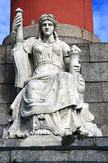 column, red, rostral, pillars, victory, naval, statue, white, female, sky, sculpture, art and craft, human representation, representation, male likeness, architecture, creativity, craft, religion, history, the past, spirituality, belief, no people, built structure, low angle view, day, travel destinations, carving - craft product, stone material, outdoors, 1080P, CC0, public domain, royalty free