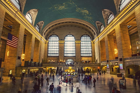 grand, central, terminal, interior, architecture, building, ceiling, city, column, daylight, flag, grand central, group, landmark, light, people, tourism, tourist, transportation system, travel, urban, usa, window, crowd, large group of people, group of people, real people, arch, travel destinations, built structure, illuminated, railroad station, men, walking, indoors, the past, blurred motion, history, architectural column, 2K, CC0, public domain, royalty free