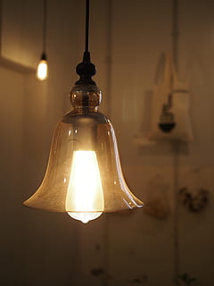 brown pendant lamp, lightbulb, light, lantern, decoration, indoor, lamp, glas, electric Lamp, light Bulb, lighting Equipment, illuminated, glowing, hanging, indoors, electricity, pendant light, focus on foreground, no people, glass - material, wall - building feature, close-up, electric light, transparent, light - natural phenomenon, table, filament, ceiling, 2K, CC0, public domain, royalty free