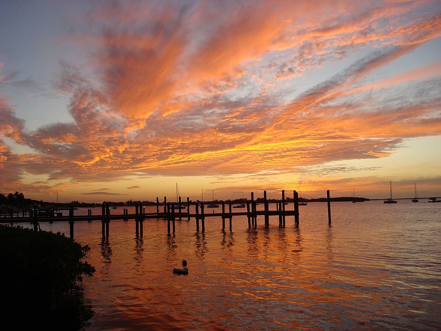 posta de sol, clau, key largo, florida, posta de sol, key largo, florida, reflexió, color taronja, silueta, aigua, núvol - cel, cel, escenics - natura, bellesa a la natura, tranquil·litat, escena tranquil·la, mar, davant del mar, cap gent, idíl·lic, naturalesa, moll, escena no urbana, publicació, a l'aire lliure, post de fusta, cel romàntic, 2K
