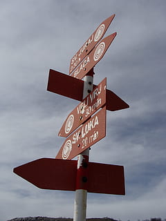 where, sign, mountain, path, information, caution, symbol, message, label, table, direction, communication, text, sky, guidance, no people, cloud - sky, western script, directional sign, low angle view, arrow symbol, road sign, nature, day, information sign, road, outdoors, 2K, CC0, public domain, royalty free