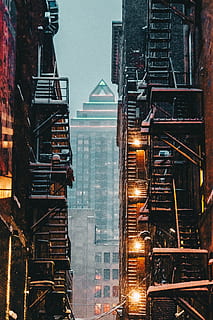 photography, brown, concrete, building, architecture, infrastructure, structure, establishment, apartment, windows, condominium, hotel, building exterior, built structure, no people, outdoors, skyscraper, night, illuminated, city, fire escape, staircase, low angle view, steps and staircases, nature, railing, residential district, metal, industry, tall - high, sky, 5K, CC0, public domain, royalty free