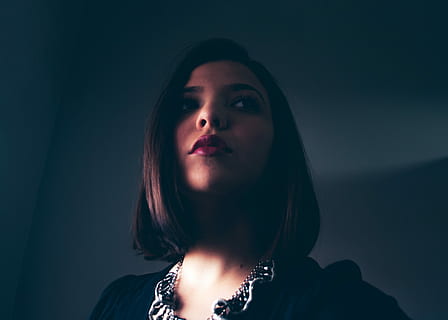 woman, wearing, black, white, scoop-neck shirt, black and white, scoop-neck, shirt, women, people, one Person, females, beauty, adult, young Adult, beautiful, fashion, portrait, caucasian Ethnicity, sensuality, one Woman Only, looking, elegance, human Face, headshot, only women, adults only, front view, indoors, lifestyles, young women, studio shot, dark, hair, looking at camera, close-up, human body part, body part, leisure activity, hairstyle, beautiful woman, contemplation, black background, 2K