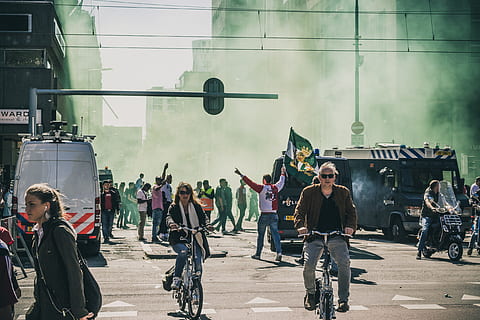 group, people, stranded, smoke, street, daytime, Celebration, military, group of people, war, army soldier, adult, men, transportation, real people, bicycle, architecture, crowd, large group of people, city, women, mode of transportation, built structure, land vehicle, lifestyles, building exterior, casual clothing, city life, outdoors, 5K, CC0, public domain, royalty free