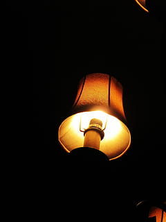 Lamp, Light, Lighting, Bulb, illumination, illuminated, dark, energy, shine, shining, glow, glowing, incandescent, bright, lighting equipment, light bulb, night, orange color, electricity, low angle view, no people, electric lamp, copy space, indoors, close-up, electric light, lantern, street light, street, light - natural phenomenon, black background, paper lantern, electrical equipment, ceiling, 4K, CC0, public domain, royalty free