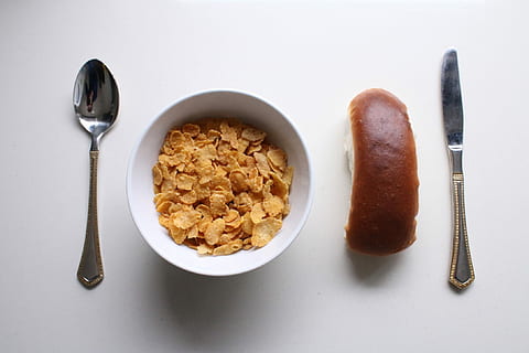 Breakfast, Bread, Food, Tasty, good morning, corn flakes, fork, knife, spoon, healthy, no people, white background, healthy eating, indoors, kitchen utensil, food and drink, eating utensil, bowl, meal, wellbeing, breakfast cereal, studio shot, household equipment, morning, table, directly above, close-up, silver colored, steel, alloy, porridge, 1080P, CC0, public domain, royalty free