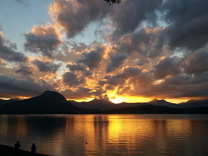 sunset, lake, sky, clouds, outdoors, scenic, tranquil, stratosphere, atmosphere, high, weather, meteorology, cloudscape, view, environment, nature, water, beauty in nature, scenics - nature, cloud - sky, mountain, tranquil scene, tranquility, silhouette, waterfront, idyllic, orange color, mountain range, reflection, non-urban scene, remote, no people, 2K, CC0, public domain, royalty free