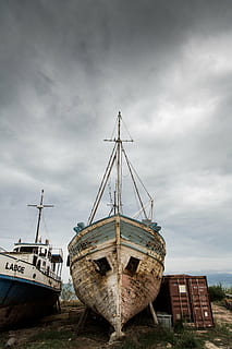 brown, gray, abandoned, boat, cargo trailer, daytime, white, blue, near, container, van, nature, coast, shore, sky, clouds, ships, boats, wreck, crates, grass, nautical vessel, cloud - sky, moored, no people, harbor, building exterior, commercial dock, sea, architecture, mode of transportation, transportation, ship, water, overcast, run-down, day, deterioration, obsolete, decline, damaged, outdoors, sailboat, fishing boat, 5K, CC0, public domain, royalty free