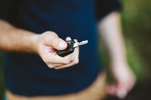 man, holding, car keys, Young, caucasian, boy, car key, human Hand, outdoors, people, men, one Person, adult, caucasian Ethnicity, close-up, crime, shooting a weapon, weapon, handgun, human body part, hand, social issues, midsection, focus on foreground, day, sign, nature, warning sign, casual clothing, human limb, care, 5K
