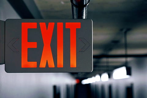 city exit sign, City, exit sign, urban, sign, transportation, guidance, arrow symbol, illuminated, text, communication, safety, western script, close-up, focus on foreground, no people, capital letter, red, black color, lighting equipment, direction, indoors, directional sign, warning sign, leaving, message, 4K
