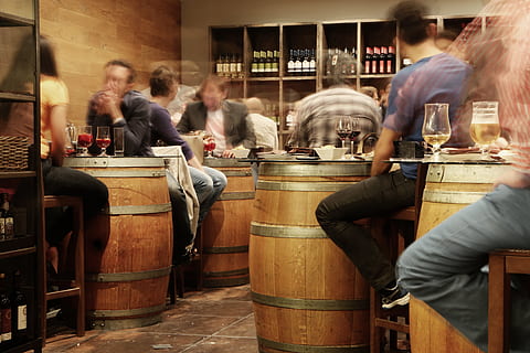 brown, wooden, barrel tables, inside, room, bar, pub, restaurant, rustic, barrels, people, sitting, spain, madrid, tapas, spanish, food, traditional, typical, europe, interior, wine, beer, alcohol, snacks, eating, drinking, bottles, tiles, shelves, food and drink, drink, group of people, refreshment, table, men, real people, business, bar - drink establishment, adult, cafe, seat, women, incidental people, beer - alcohol, food and drink industry, beer glass, glass, 5K, CC0, public domain, royalty free