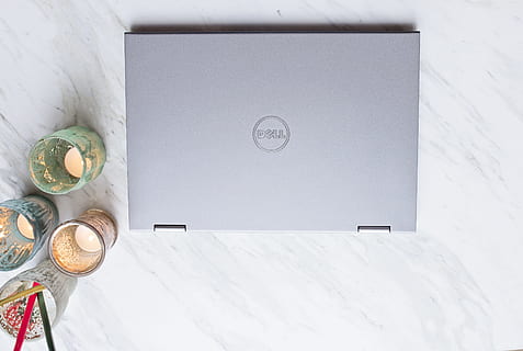 close-up photo, gray, dell laptop, blur, close-up, computer, dell, electronics, focus, gadget, glass, laptop, light, marble, modern, indoors, no people, table, food and drink, still life, bed, high angle view, furniture, healthy eating, clock, white color, food, day, finance, publication, technology, wellbeing, bedroom, book, drink, 4K, CC0, public domain, royalty free