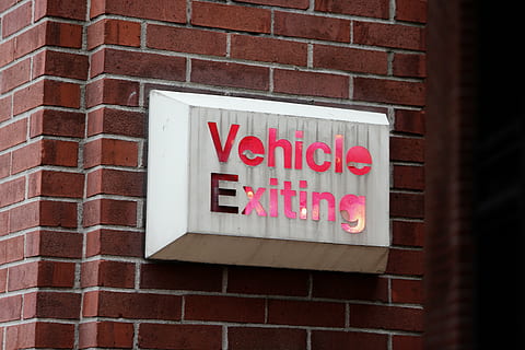 white, red, vehicle, exiting, signage, sign, bricks, exit, brick wall, text, store, no people, day, building exterior, outdoors, close-up, neon, western script, brick, wall, communication, architecture, built structure, wall - building feature, information, window, capital letter, information sign, emotion, message, 5K, CC0, public domain, royalty free