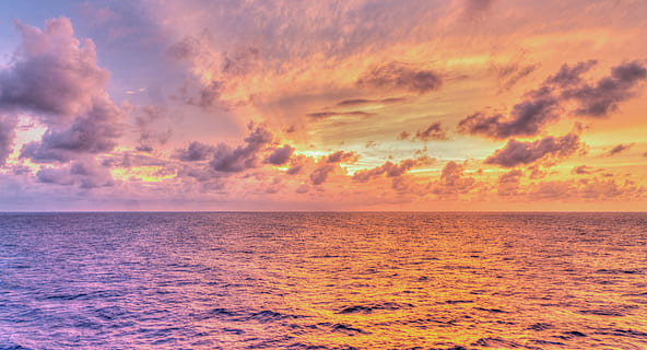 body, water, orange, sky, sunset, reflections, sun rays, nature, dawn, sun, outdoor, travel, yellow, light, ocean, colorful, cloud, sea, horizon, horizon over water, cloud - sky, beauty in nature, scenics - nature, tranquility, dramatic sky, tranquil scene, seascape, idyllic, urban skyline, environment, tropical climate, no people, outdoors, abstract, 8K, CC0, public domain, royalty free