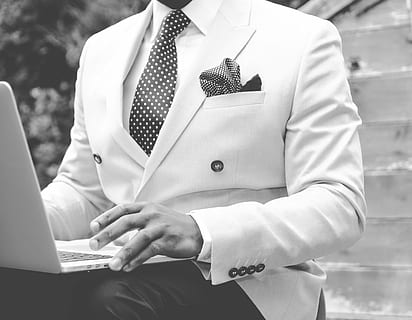 white formal attire, suit, man, dapper, work, male, business, person, businessman, people, white, adult, young, portrait, handsome, happy, success, professional, fashion, smile, executive, corporate, black, successful, confident, office, one, face, guy, manager, tie, men, modern, elegant, shirt, boss, standing, laptop, midsection, communication, technology, real people, one person, wireless technology, computer, using laptop, clothing, front view, focus on foreground, women, day, lifestyles, holding, surfing the net, 4K, CC0, public domain, royalty free