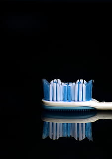 macro photography, white, blue, toothbrush, brush, studio, photo, hygiene, purity, black, teeth, black background, studio shot, copy space, indoors, no people, close-up, cut out, dental health, single object, reflection, food and drink, still life, eating utensil, freshness, fork, white color, kitchen utensil, clean, cupcake holder, 2K, CC0, public domain, royalty free