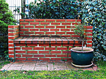 bench, brick, seat, old, stone, plant, architecture, wall, day, building exterior, brick wall, nature, built structure, no people, tree, container, growth, grass, front or back yard, metal, outdoors, red, wall - building feature, potted plant, 4K, CC0, public domain, royalty free