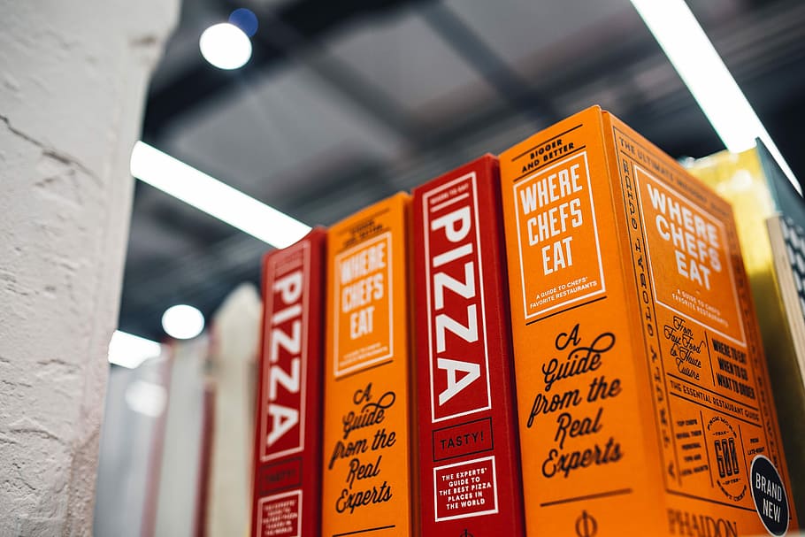 visit, bookstore, books, bookshop, knowledge, japan, editorial, store, indoors, close-up, no people, red, day, text, communication, script, non-western script, western script, selective focus, sign, low angle view, lighting equipment, built structure, hanging, focus on foreground, information, architecture, orange color, ceiling, electric lamp, 5K