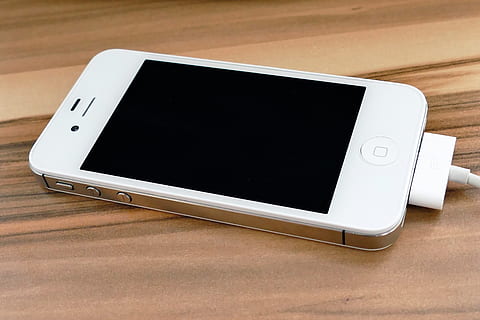 white, iphone 4, 4s, plugged, charger, iphone, screen, mobile, technology, cellphone, electronic, player, smartphone, device, telephone, media, music, digital, call, internet, display, modern, monitor, communication, apple, connection, computer, multimedia, flat, tablet, web, information, network, wireless technology, portable information device, smart phone, mobile phone, device screen, table, portability, touch screen, wood - material, digital tablet, indoors, no people, high angle view, copy space, blank, liquid-crystal display, electronic organizer, social networking, electrical equipment, 5K, CC0, public domain, royalty free