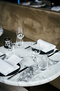 table, two, set, wine glass, marble, tableware, dining, glass, household equipment, food and drink, drinking glass, restaurant, wineglass, eating utensil, kitchen utensil, plate, business, setting, still life, indoors, absence, place setting, fork, glass - material, napkin, no people, table knife, crockery, 4K, CC0, public domain, royalty free