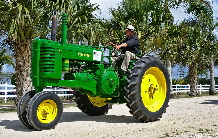 tractor, màquina, sistema de transport, roda, equipament, vehicle, pesat, maquinària, conduir, carretera, motor, antiguitat, màquina agrícola, vell, vintage, agrícola, Agricultura, poder, país, rural, industrial, verd, belize, mirador espanyol, arbre, transport, manera de transport, una persona, homes, dia, planta, vehicle terrestre, maquinària agrícola, Palmera, naturalesa, equipament agrícola, adult, llum solar, ocupació, clima tropical, color verd, a l'aire lliure, 5K