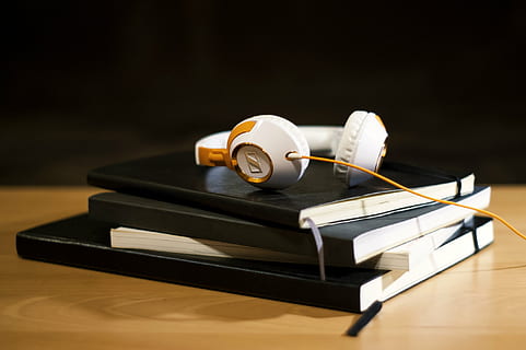 white corded headphones, white, sennheiser, corded, headphones, top, four, black, labeled, stackable, books, brown, wooden, surface, background, notepad, notebook, objects, audio, old-fashioned, book, no people, studio shot, black background, music, indoors, close-up, day, table, publication, still life, group of objects, wood - material, wisdom, stack, antique, focus on foreground, box, medium group of objects, box - container, rolled up, 2K, CC0, public domain, royalty free