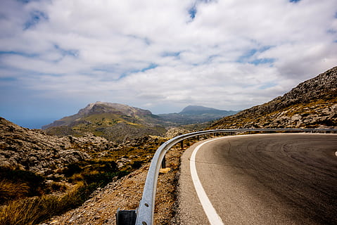 asphalt, clouds, desert, empty, foggy, grass, highway, hill, landscape, misty, mountain, murky, road, roadline, rock, rocks, sand, scenic, sky, travel, trees, cloud - sky, the way forward, transportation, direction, environment, beauty in nature, non-urban scene, nature, scenics - nature, mountain range, mountain road, tranquility, winding road, no people, day, remote, outdoors, 5K